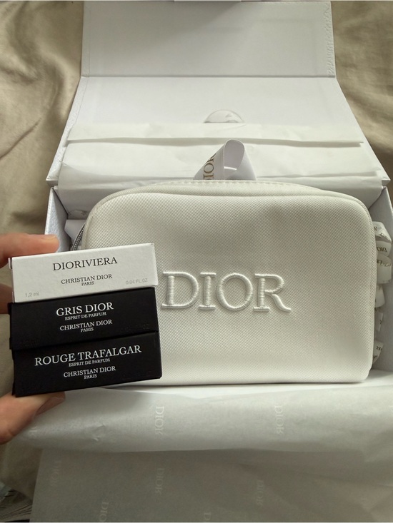 Dior Other - Dior White Embossed pouch with 3 samples in a gift box with a bow